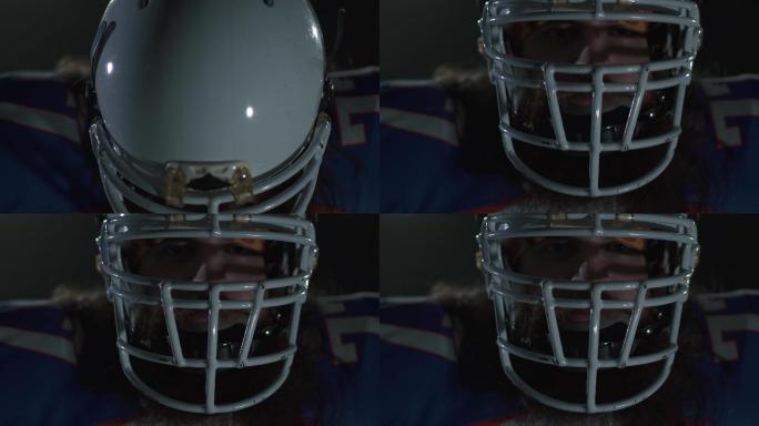 戴着头盔的美式足球运动员的特写肖像