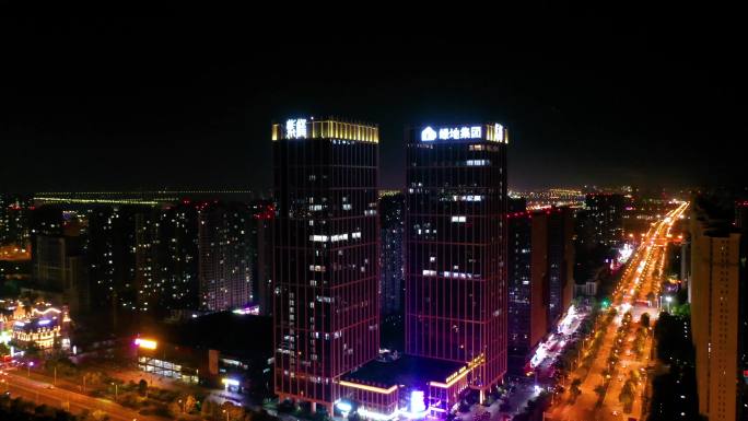 航拍安徽安庆城市地标绿地夜景为袁隆平亮灯