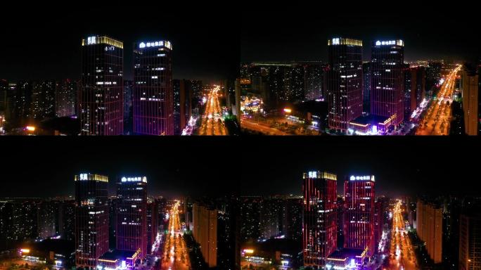 航拍安徽安庆城市地标绿地夜景为袁隆平亮灯