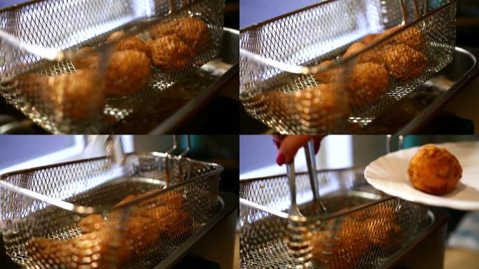 在油锅里炸鸡肉准备食物配料金色