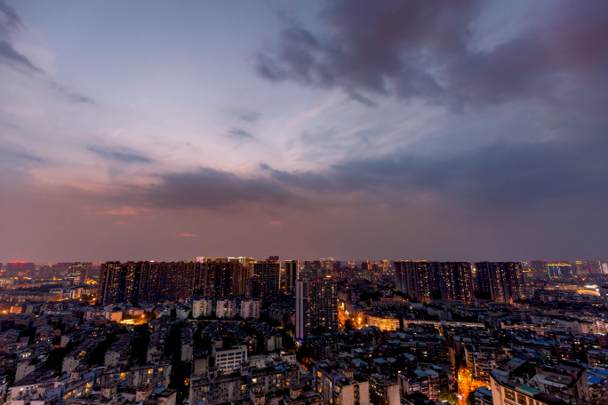 城市日转夜万家灯火城市亮灯延时