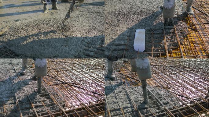 工人们在楼顶浇注混凝土