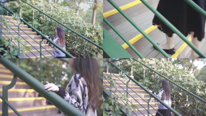 女生走公园里的楼梯