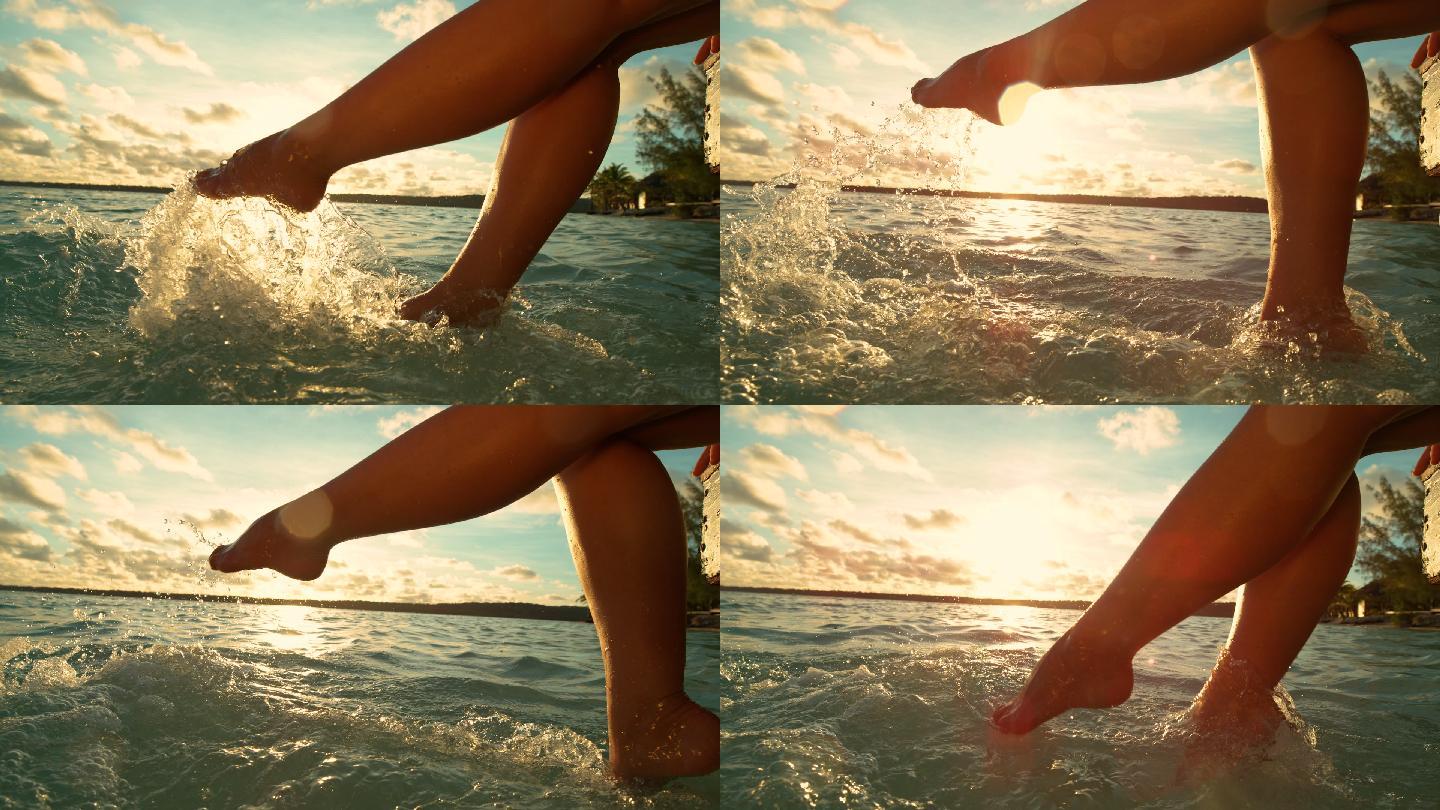 女孩用脚玩水脚扫水脚拍水光脚