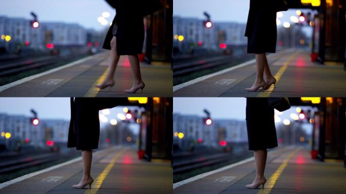 女商人在站台上等待火车镜头