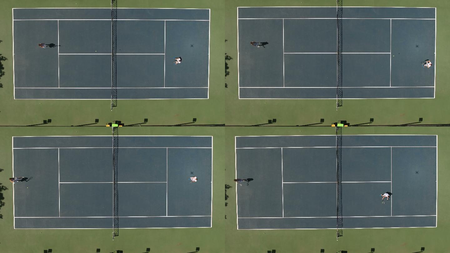 男女在球场上打网球
