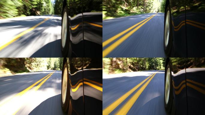 在山路上驾驶汽车的低角度镜头。