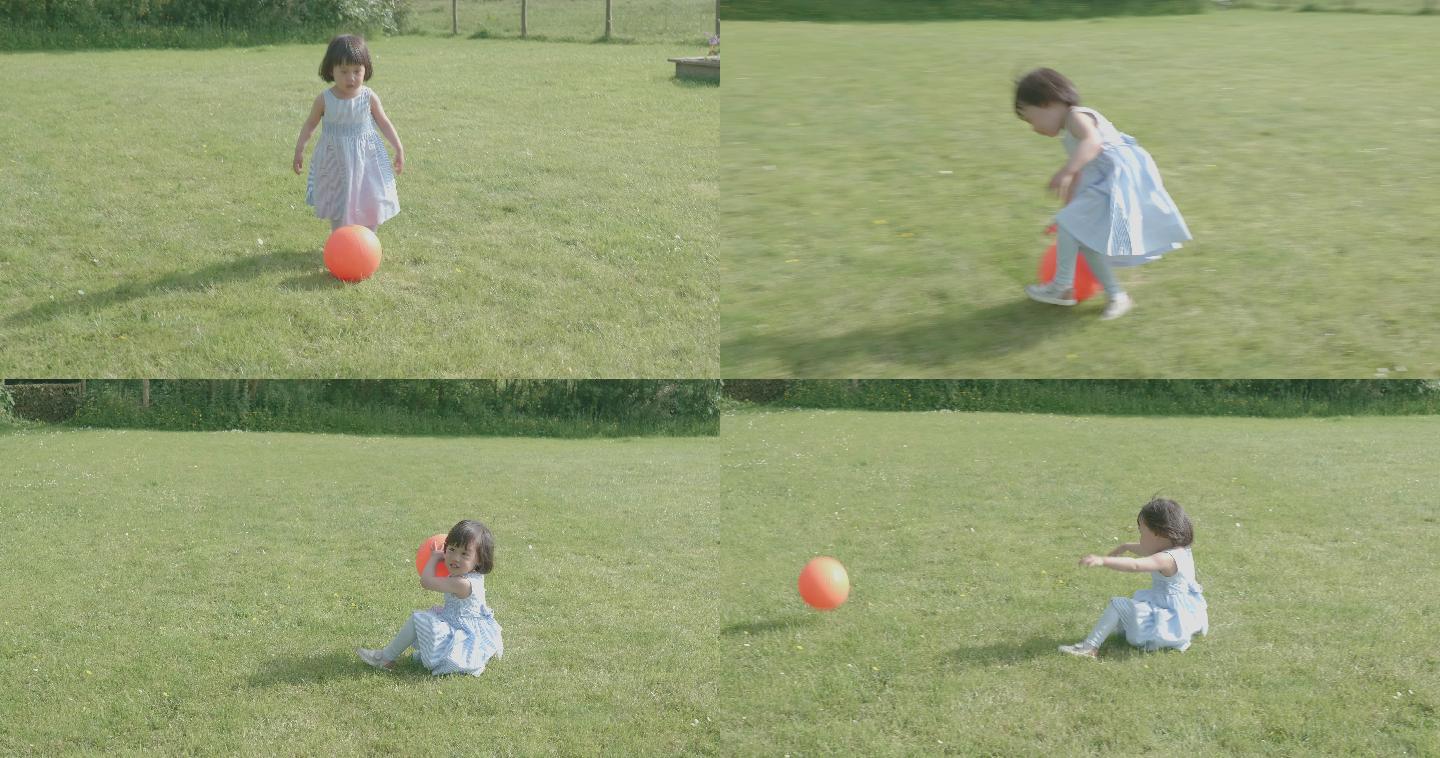 小女孩在夏日乡村花园玩皮球
