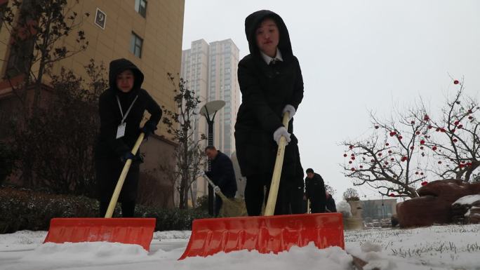 楼宇房产地宣传小区雪景扫雪