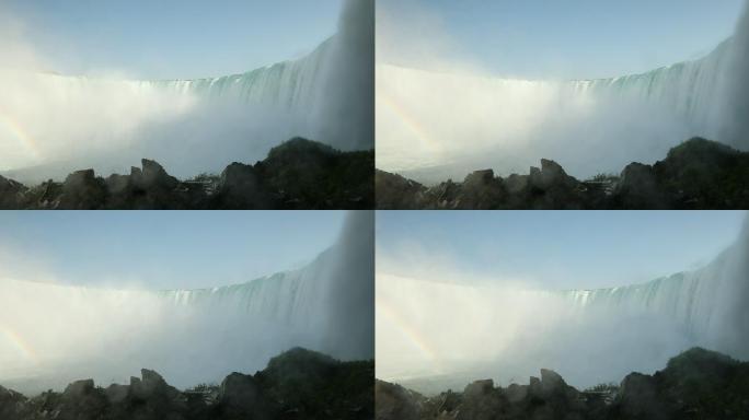 瀑布间的彩虹飞流直下倾泻流水生态环境