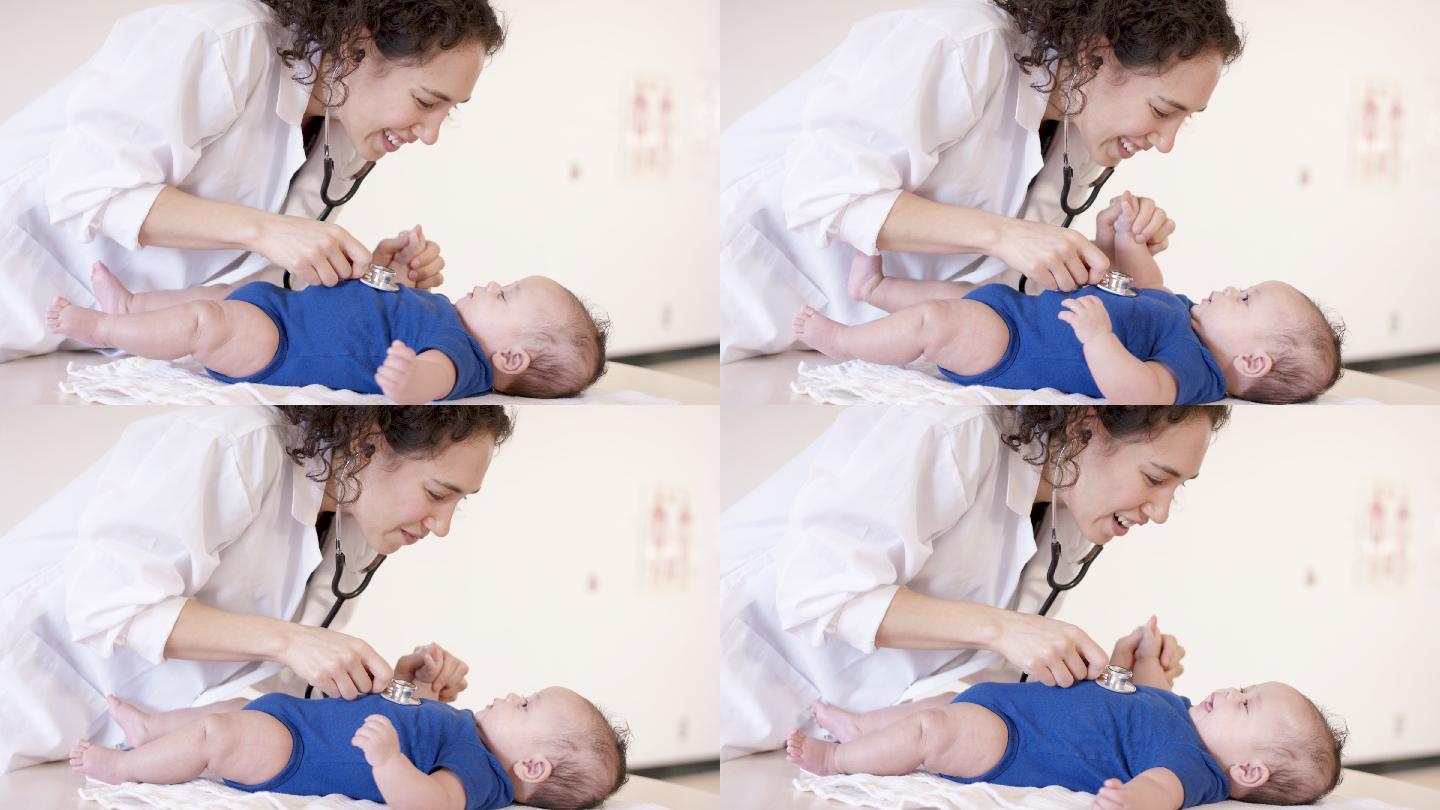 儿科女医生带着宝宝做检查
