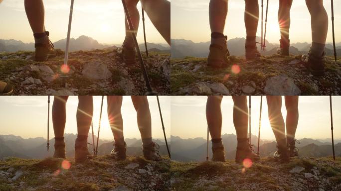 登上山顶。成功挑战登上山顶登山爱好者