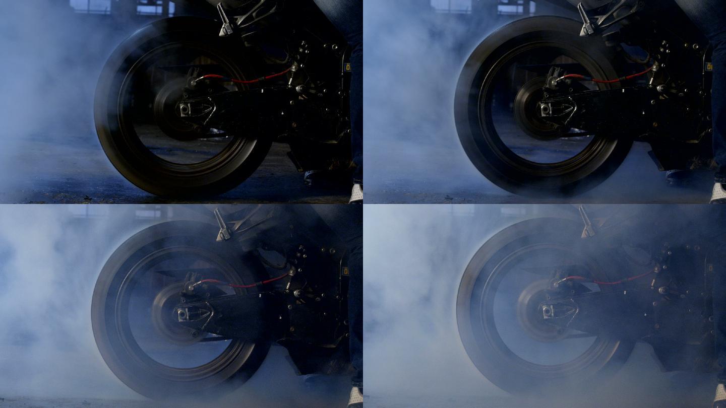 摩托车烧胎轮子转动后轮轮胎冒烟