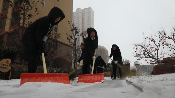 楼宇房产地宣传小区雪景扫雪