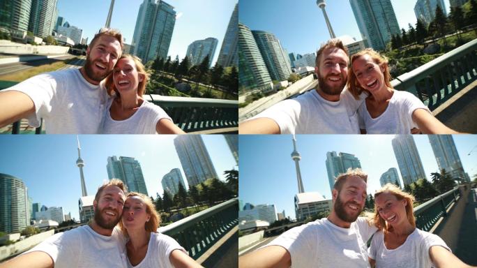 一对年轻夫妇在多伦多拍自拍照