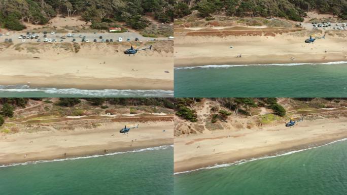 空中直升机在海滩上空飞行