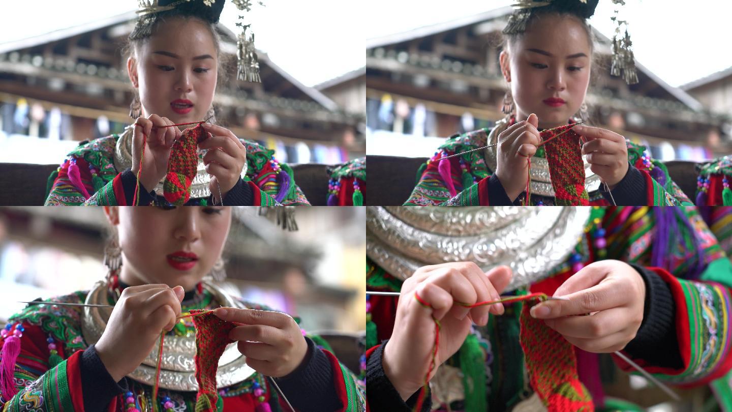 4K侗族姑娘在织毛线