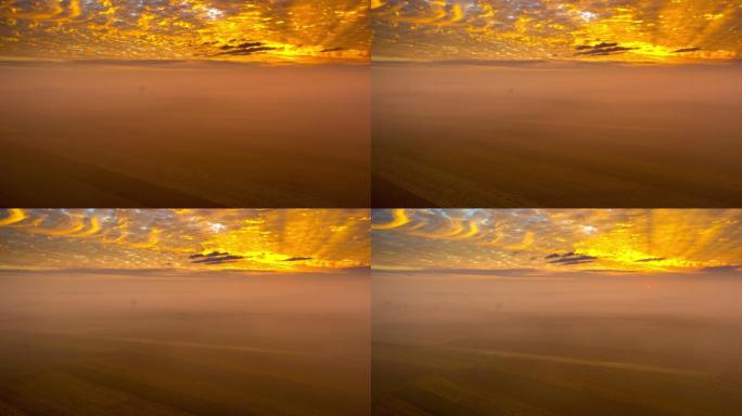 黎明时分，薄雾飘浮在平原的田野上