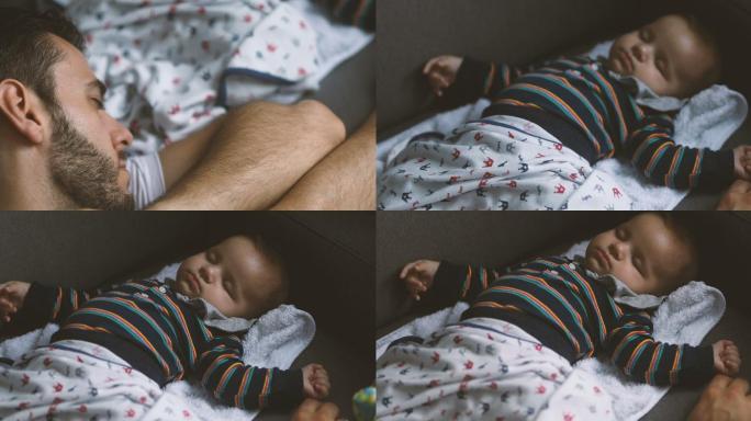 睡在沙发上的爸爸和宝宝的特写镜头