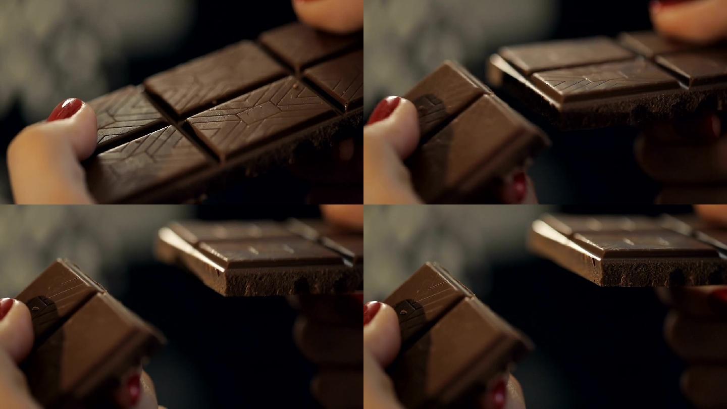 女人搬开巧克力搬开巧克力掰断巧克力分开巧