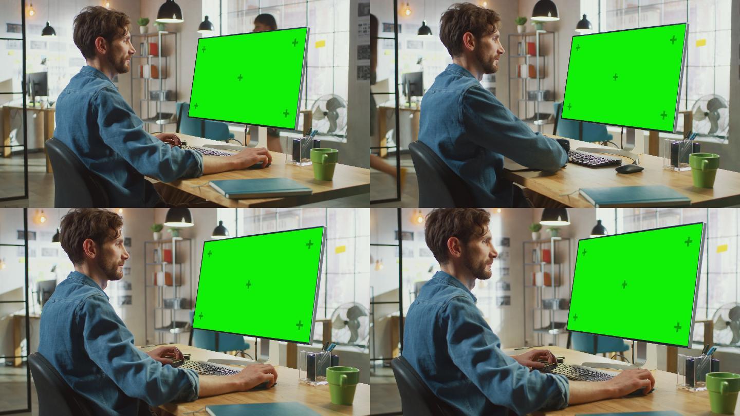 男子在办公室绿屏电脑前工作