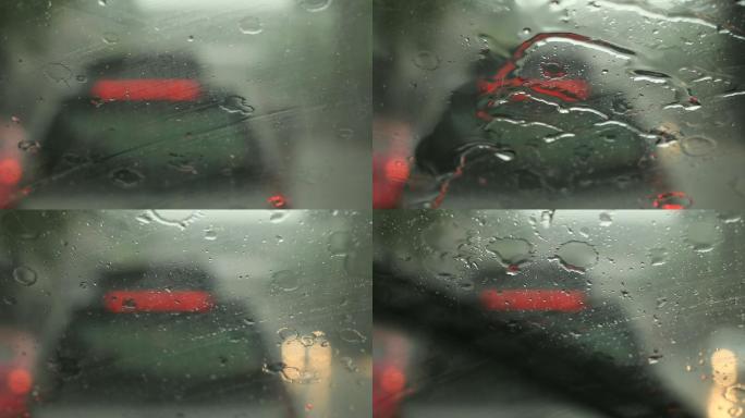 汽车雨刮器正在缓慢地排除雨水