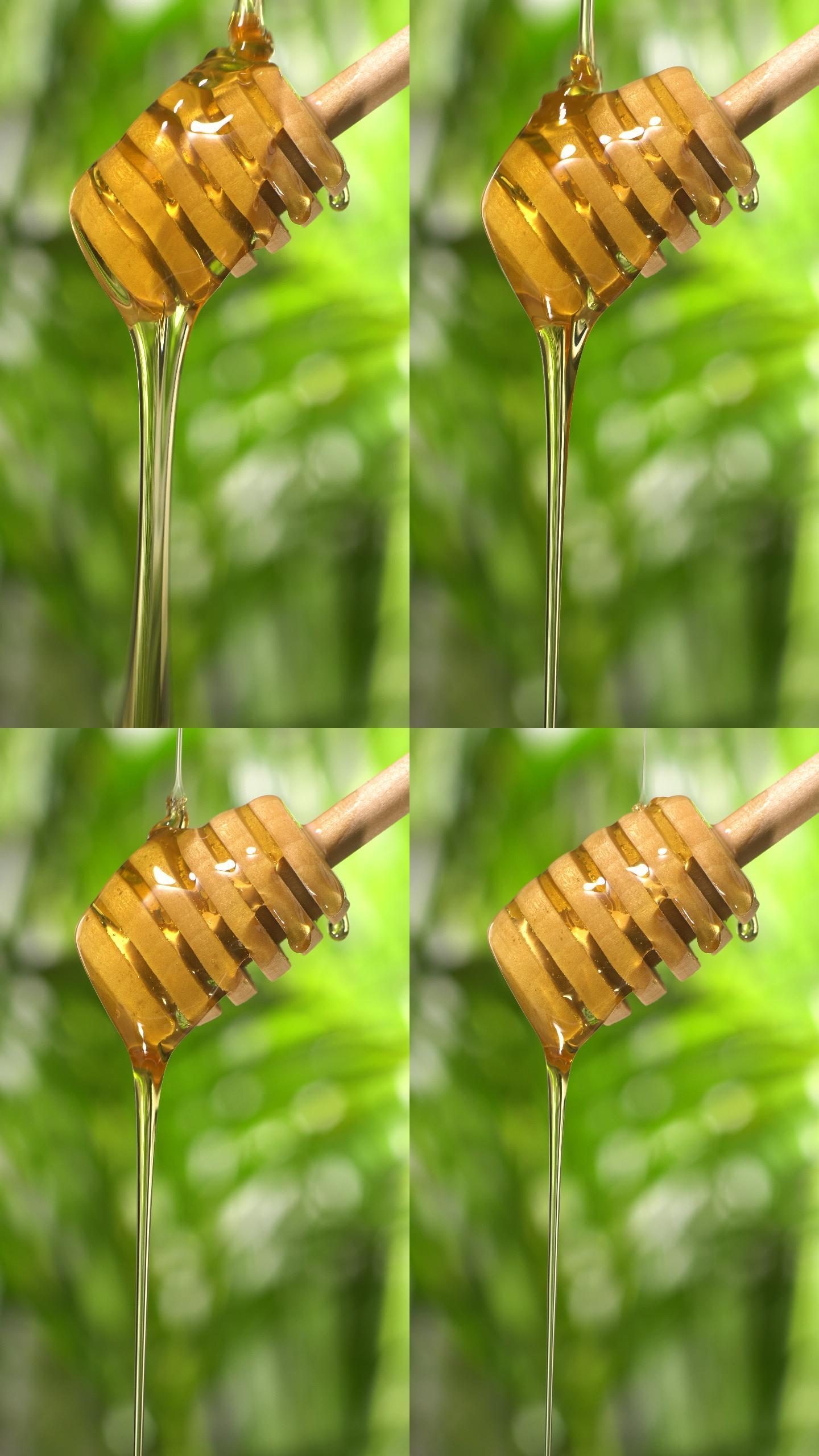 从木制蜂蜜勺流出的蜂蜜