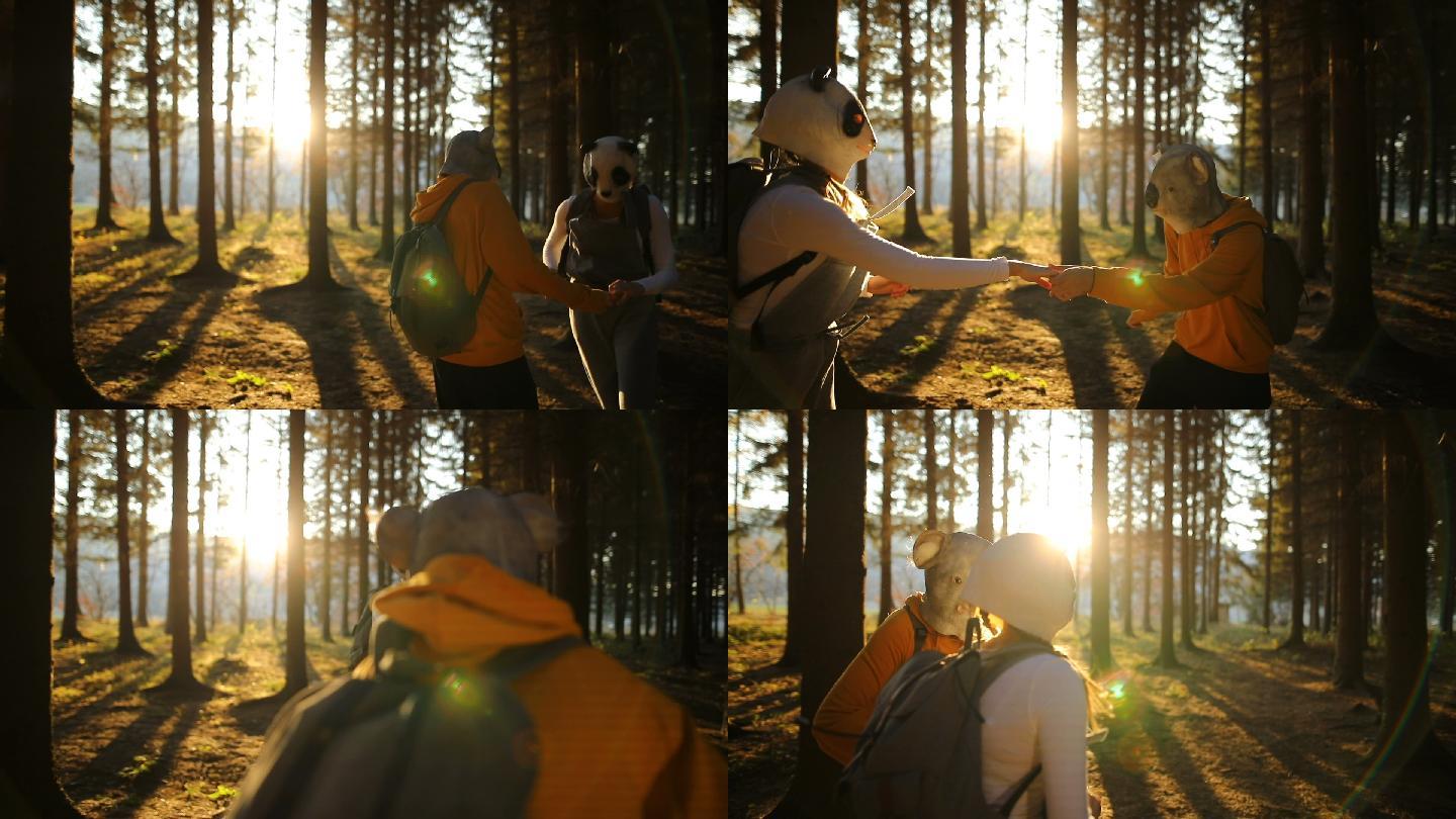 戴着头套的一对情侣在森林里玩耍