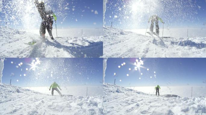 阳光明媚的冬日，滑雪者开始在山顶滑雪