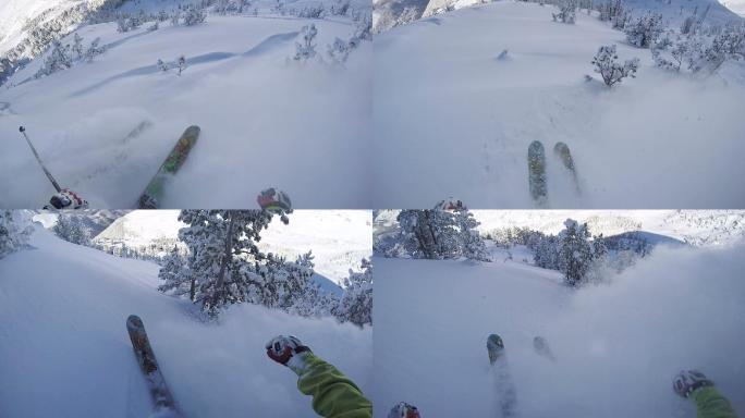 滑雪者从陡峭的山坡上滑下来