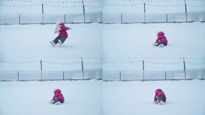 小女孩摔倒在溜冰场上
