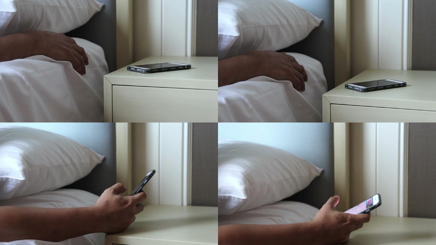 男人试图在早上醒来时用智能手机打电话