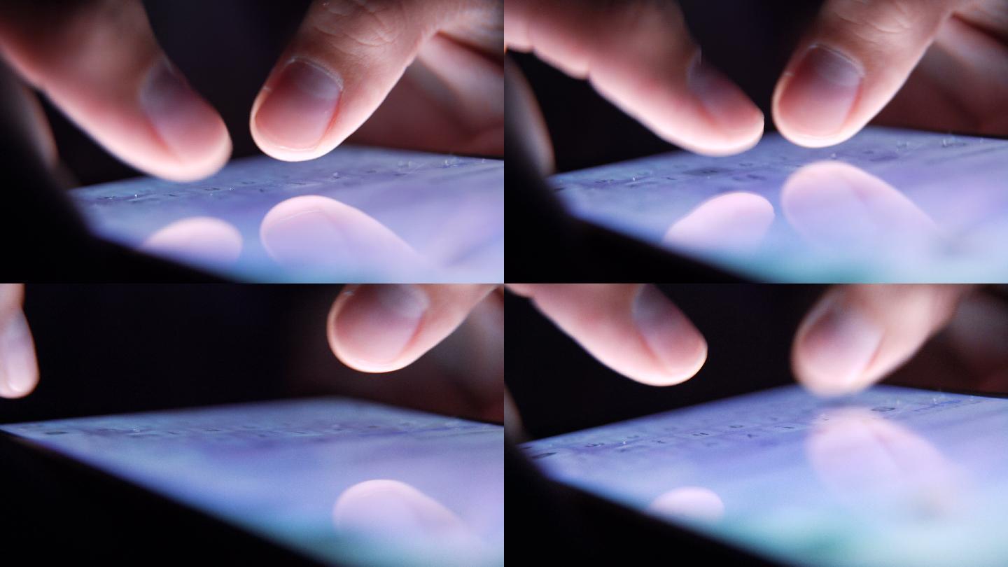 特写手指在智能手机上输入信息。