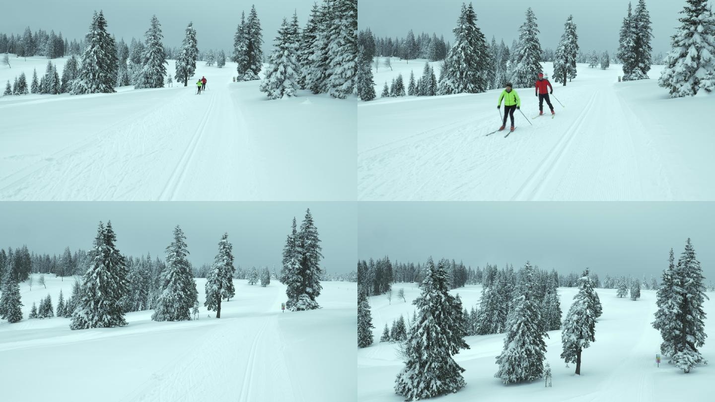 一对情侣在滑雪道上滑冰