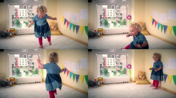 快乐的幼儿在镜头前手舞足蹈