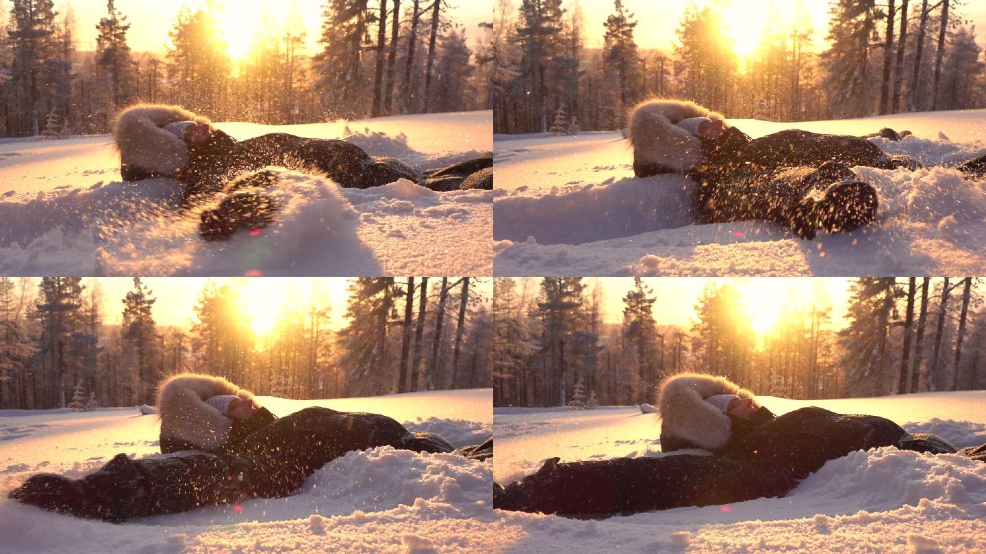 女子躺在雪地美女用手滑雪