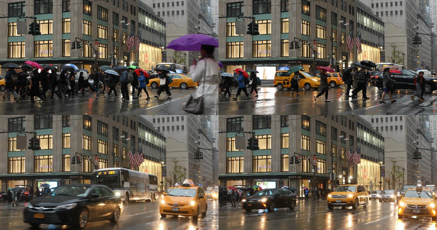 在雨中穿过纽约市第五大道街道的行人