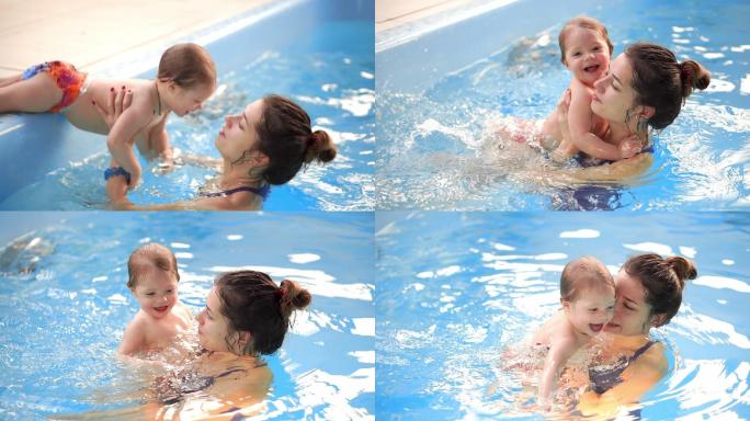 游泳池里的婴儿从侧面跳入水中