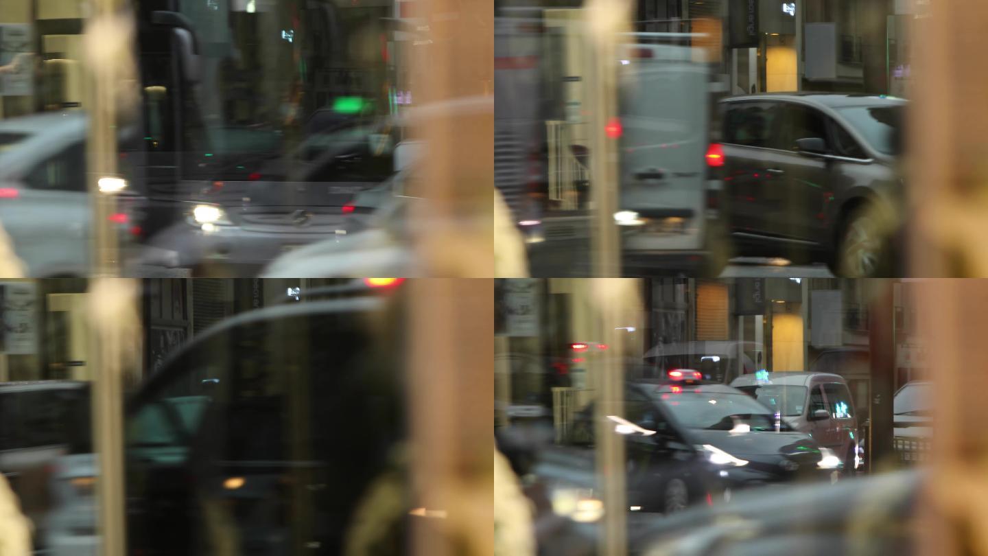 人流车流玻璃反射马路灯光