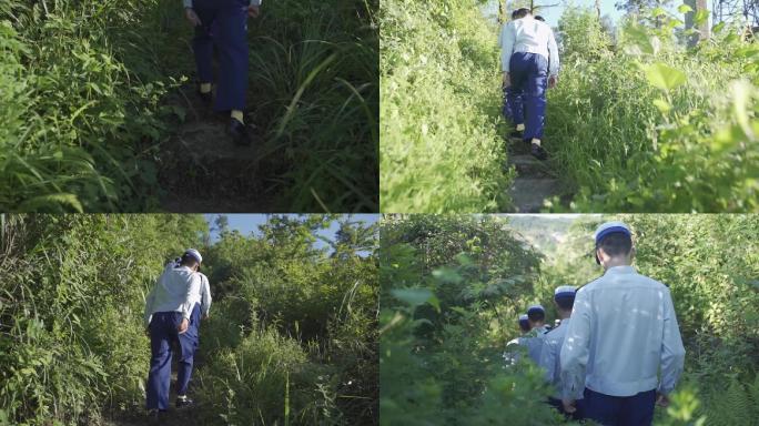 一群消防兵上山，上山登山的背影