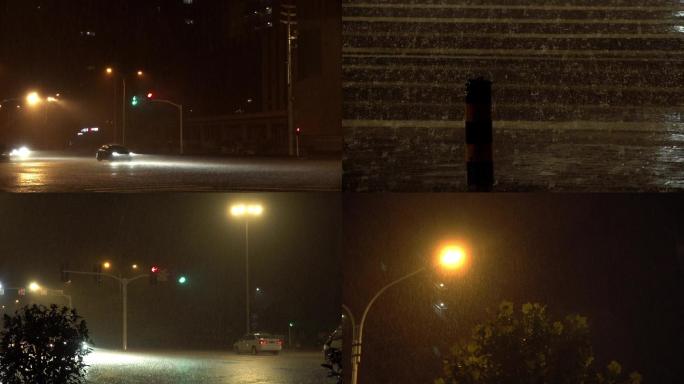 夜间城区大暴雨夜路口路灯