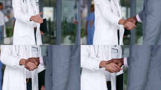医生与商人握手医患握手感谢医生救死扶伤