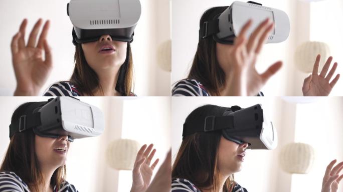 在家里用虚拟现实眼镜的女人