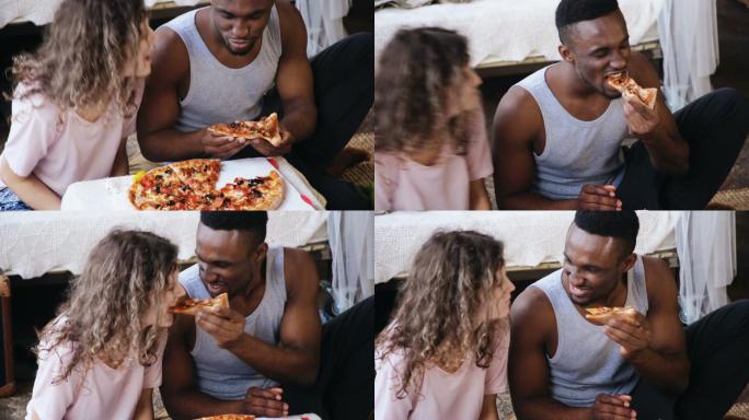 情侣吃披萨