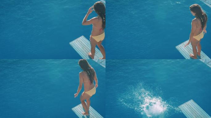一个女人在跳水板上跳进泳池