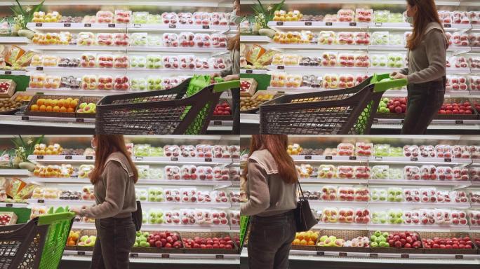女孩超市购物买水果