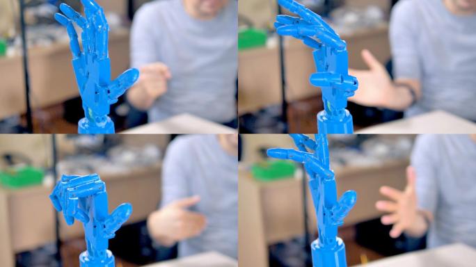一个塑料蓝色仿生手臂移动它的手指