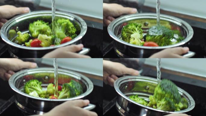 洗花椰菜和樱桃番茄慢动作视频