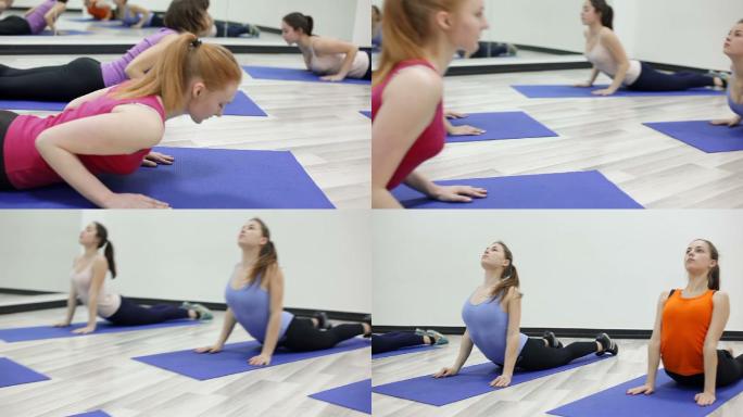 女孩在瑜伽垫上练习