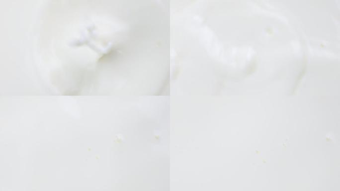 将杏仁倒入鲜奶中的慢镜头。